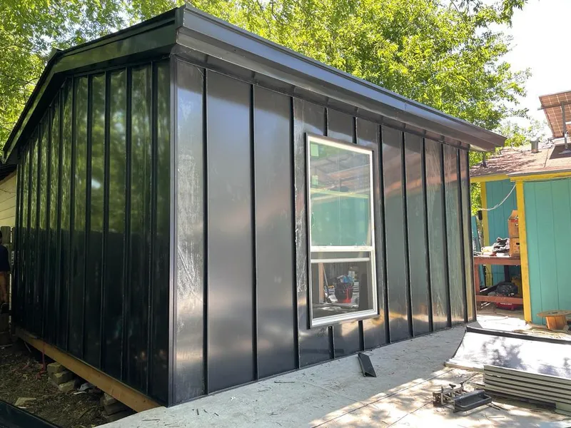 Black standing seam metal wall panels for Roof Inspection in Vidalia